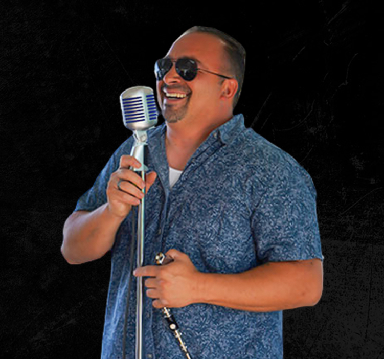 Stevie B playing the mouth organ