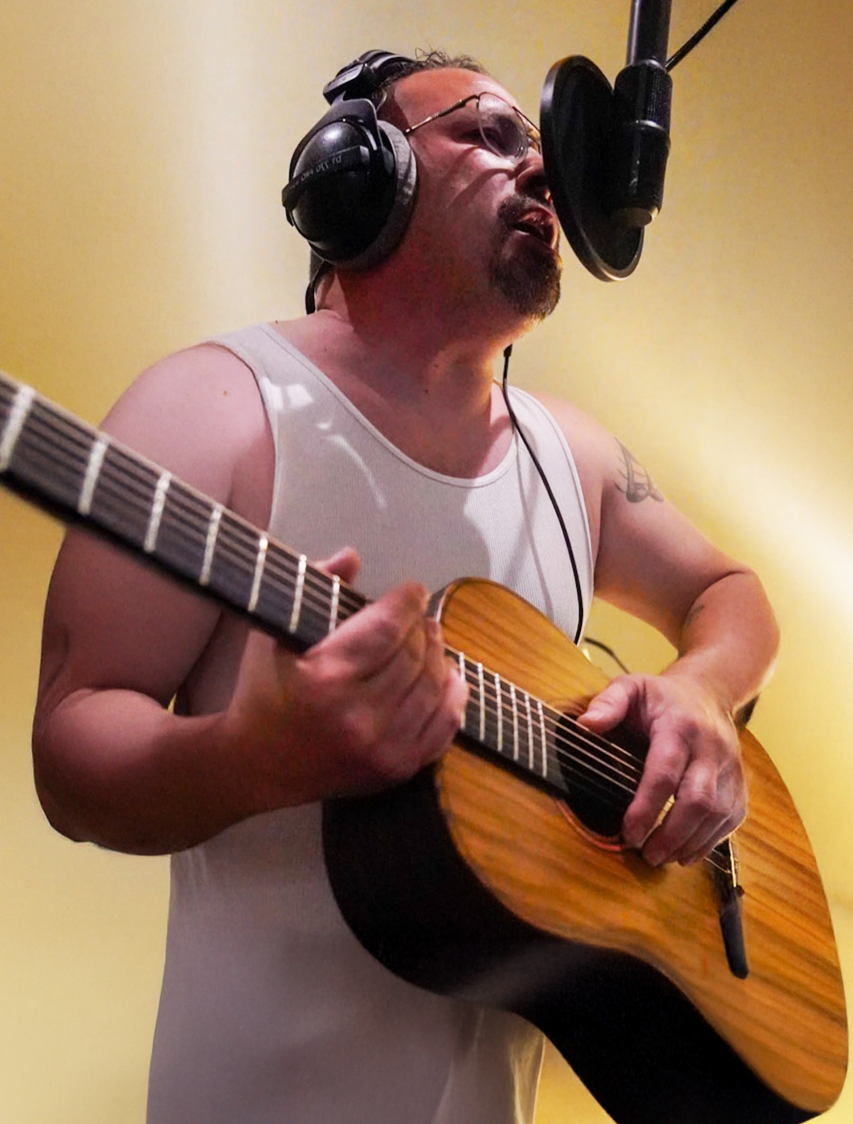 Stevie B playing the mouth organ